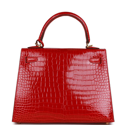 Hermès Kelly Sellier 25 Braise - Reloj de cocodrilo poroso brillante con herrajes dorados