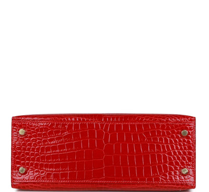 Hermès Kelly Sellier 25 Braise - Reloj de cocodrilo poroso brillante con herrajes dorados